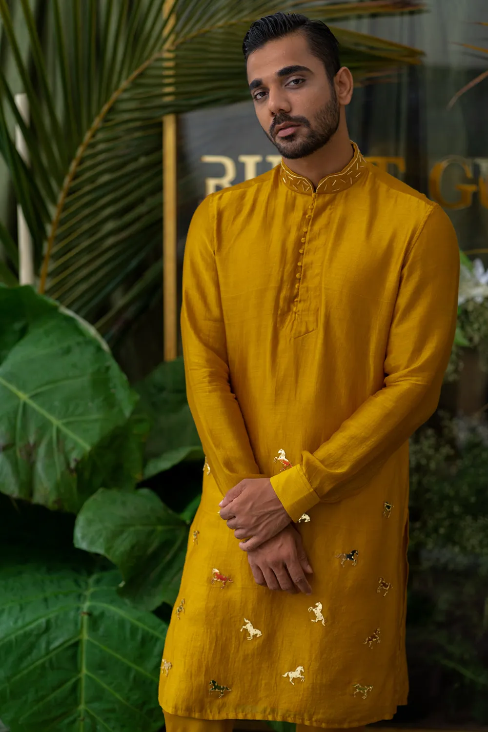 Golden Glowhorse Embroidered Kurta Sets
